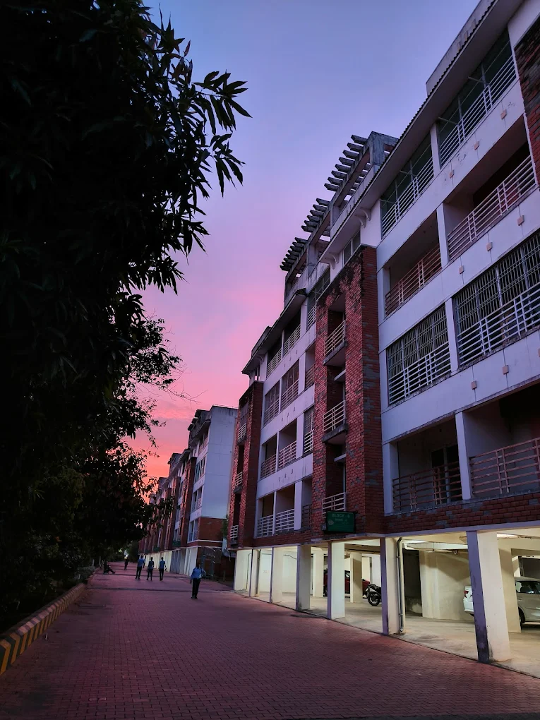 Township buildings at sunset with purple sky